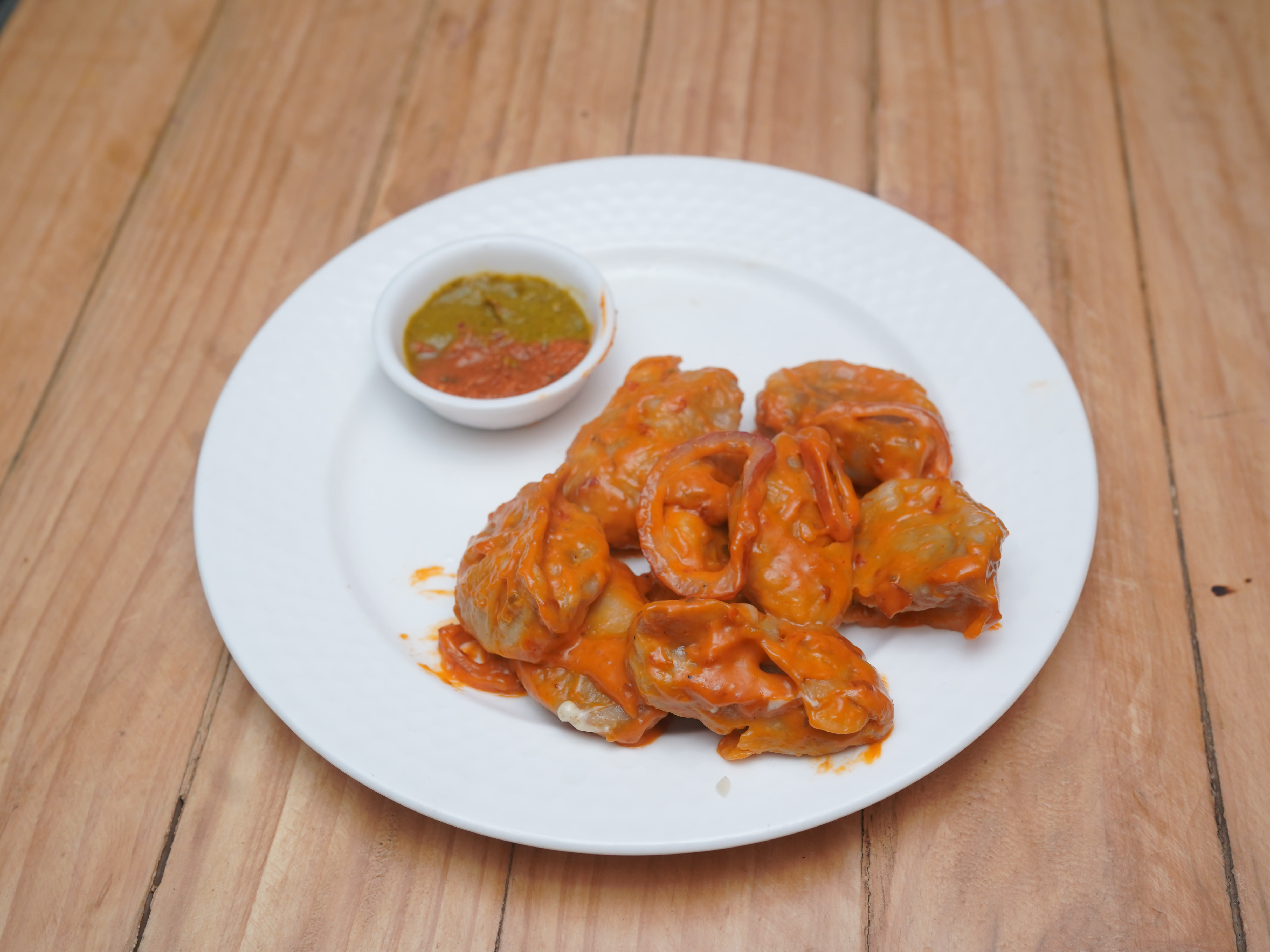 Chings Momos - Logo