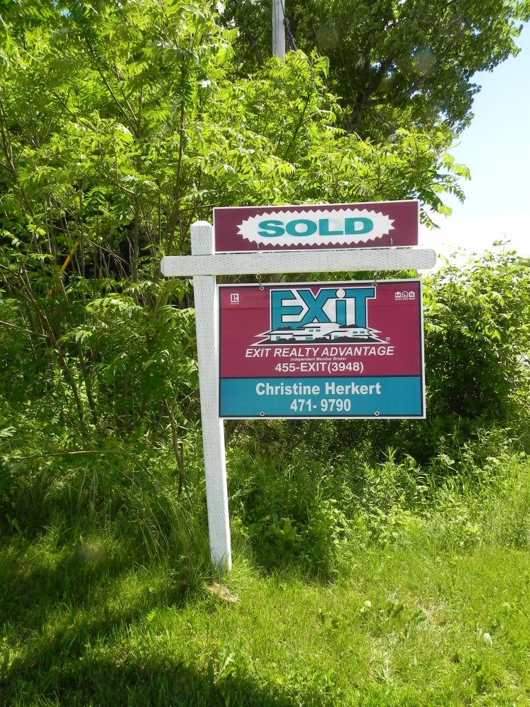 Christine Herkert Exit Realty Advantage - Logo