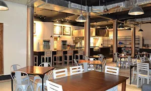 Cremeux Cafe & Bistro - Logo