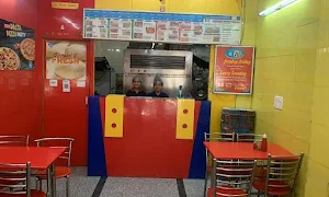 Da Pizza Corner, Madangir - Logo