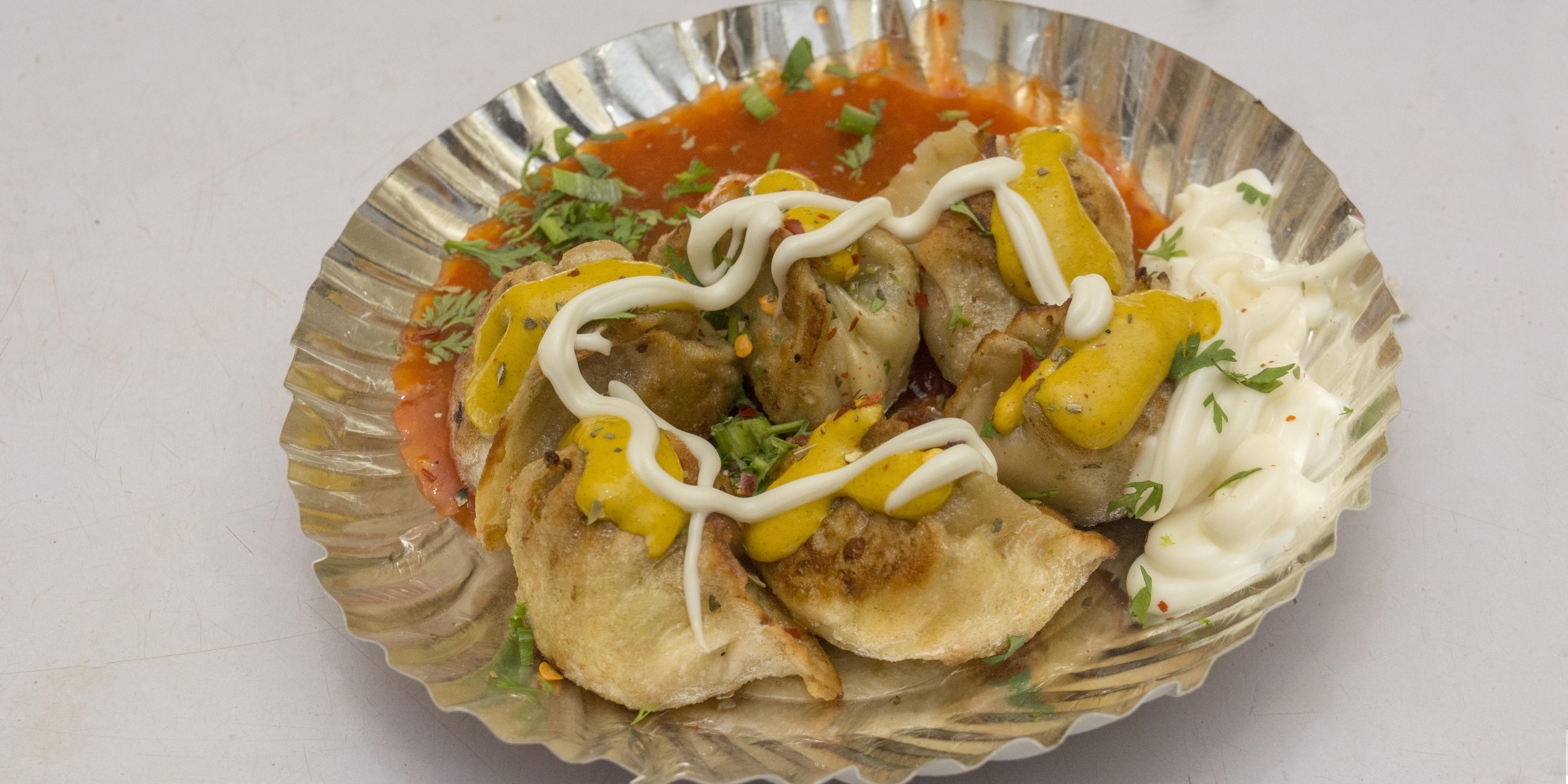 Darjeeling Momos And More-Estate - Logo