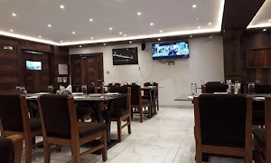 Daruchini Restaurant - Logo