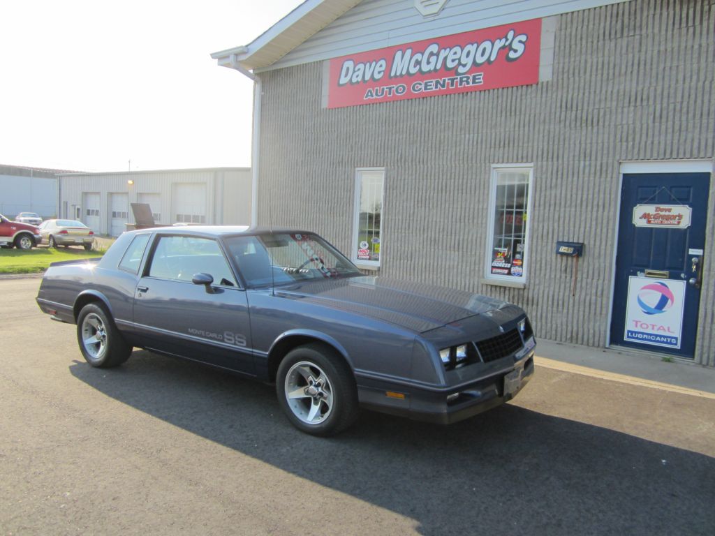 Dave MC Gregor&s;s Auto Centre - Logo