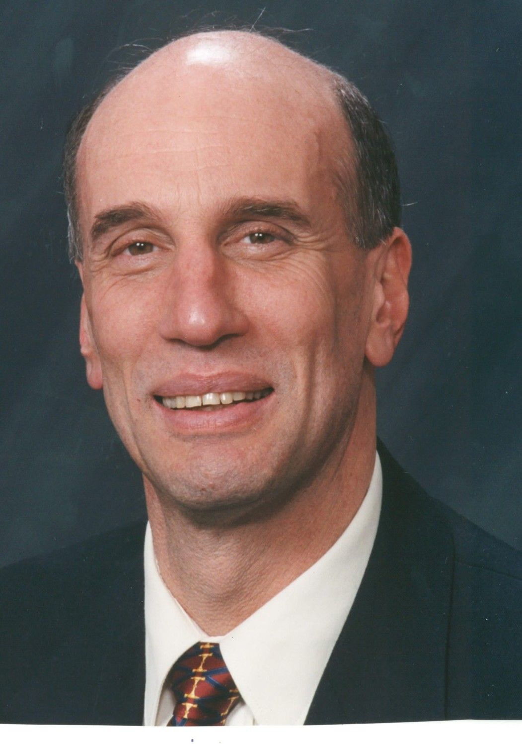 David E. White - Better Homes and Gardens Real Estate - Logo