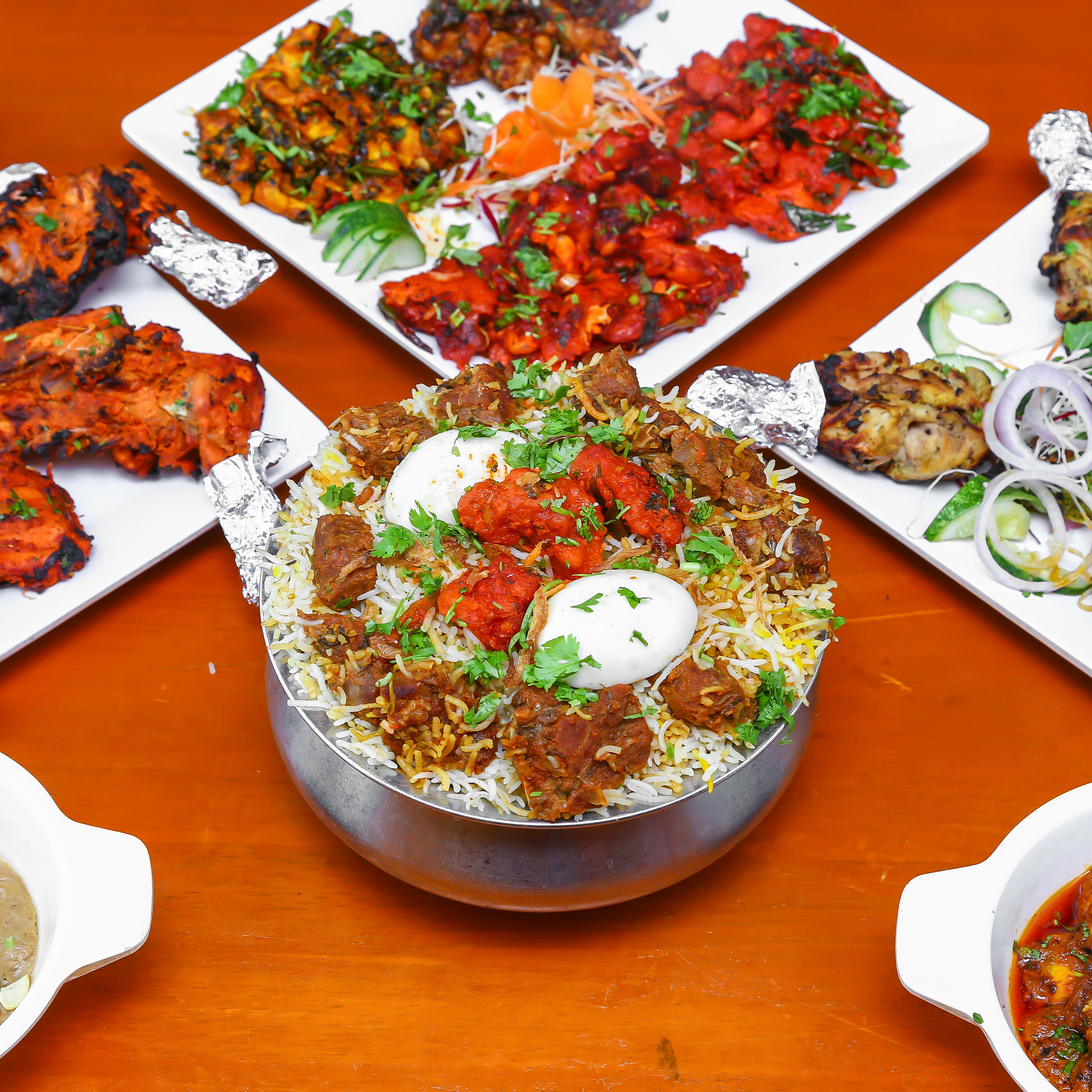Deccan Elite Multi Cuisine restaurant - Logo