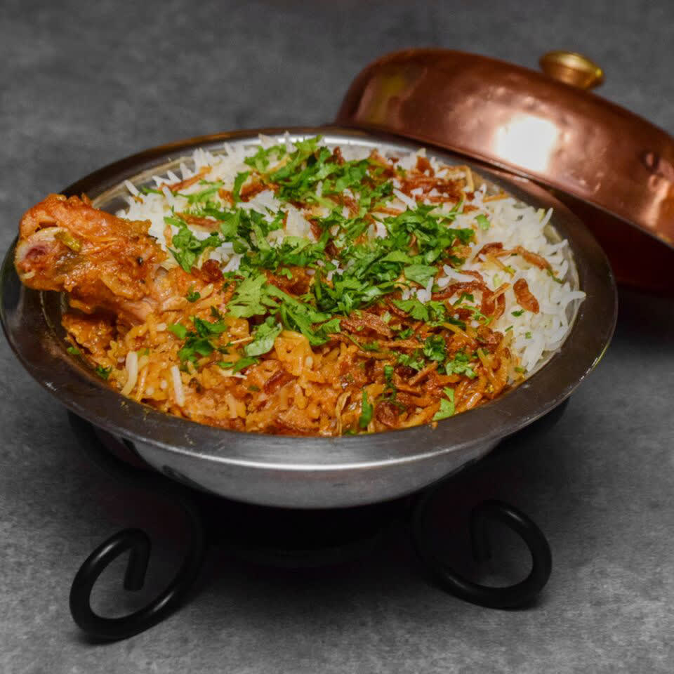 Degchi's Biryani Cafe - Logo