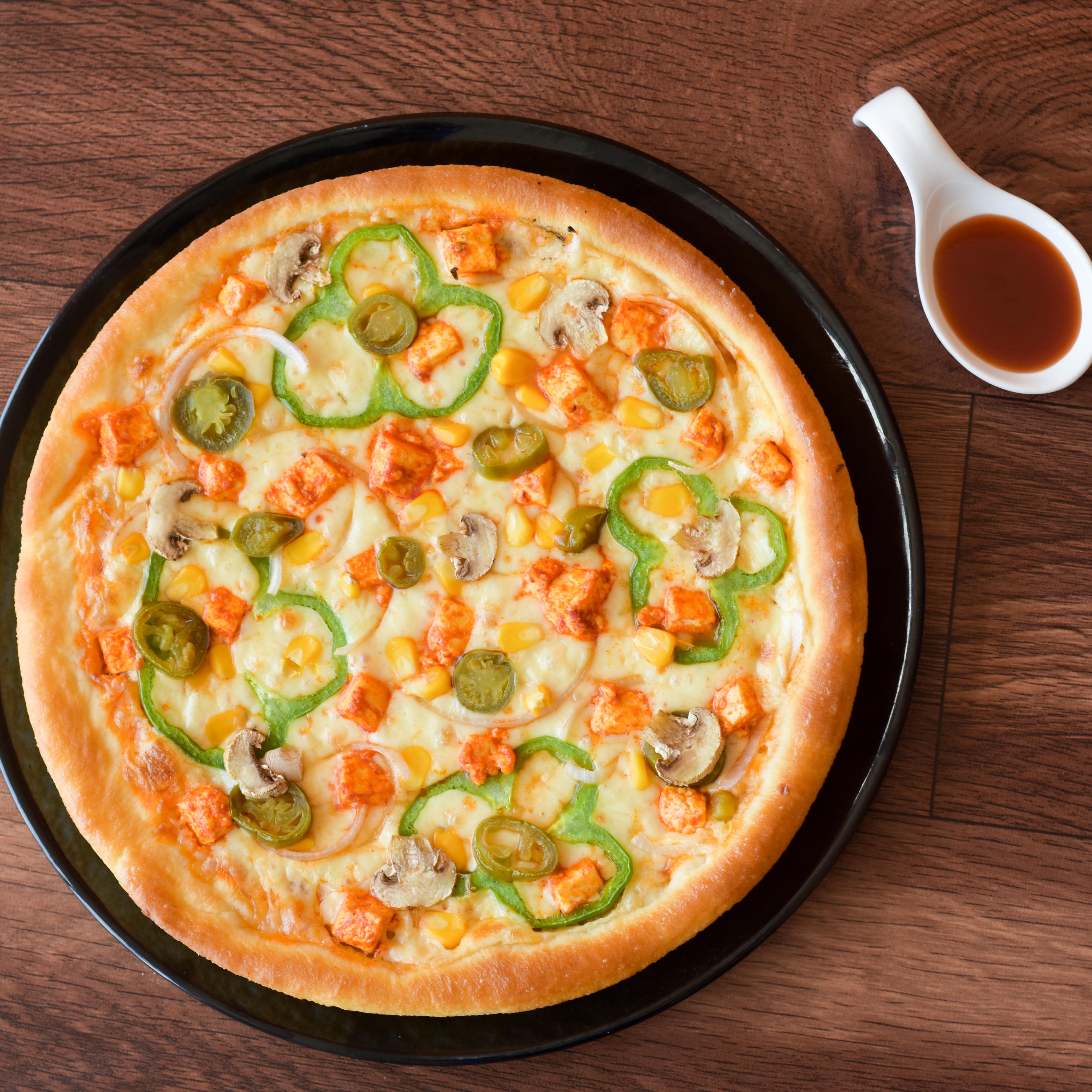 Delhi Hut pizza - Logo