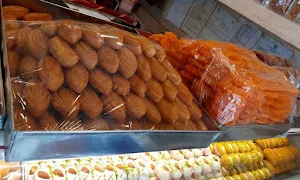 Delhi Mithai Wala - Logo