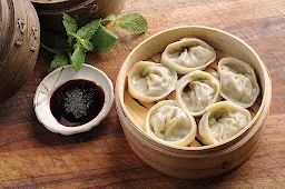 Delicious Momo Point - Logo
