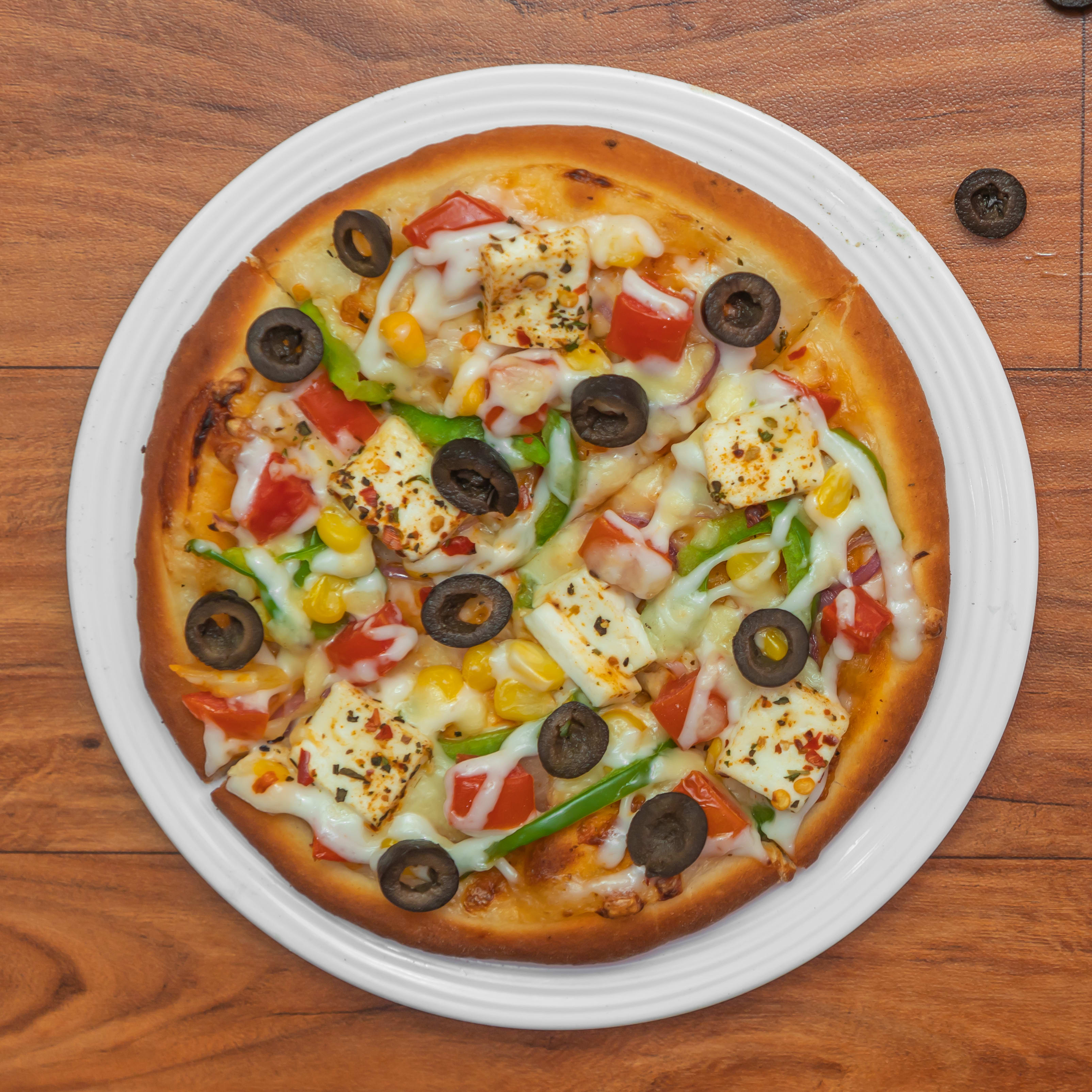 Delicious Pizza & Multi Cuisine Restaurant - Logo