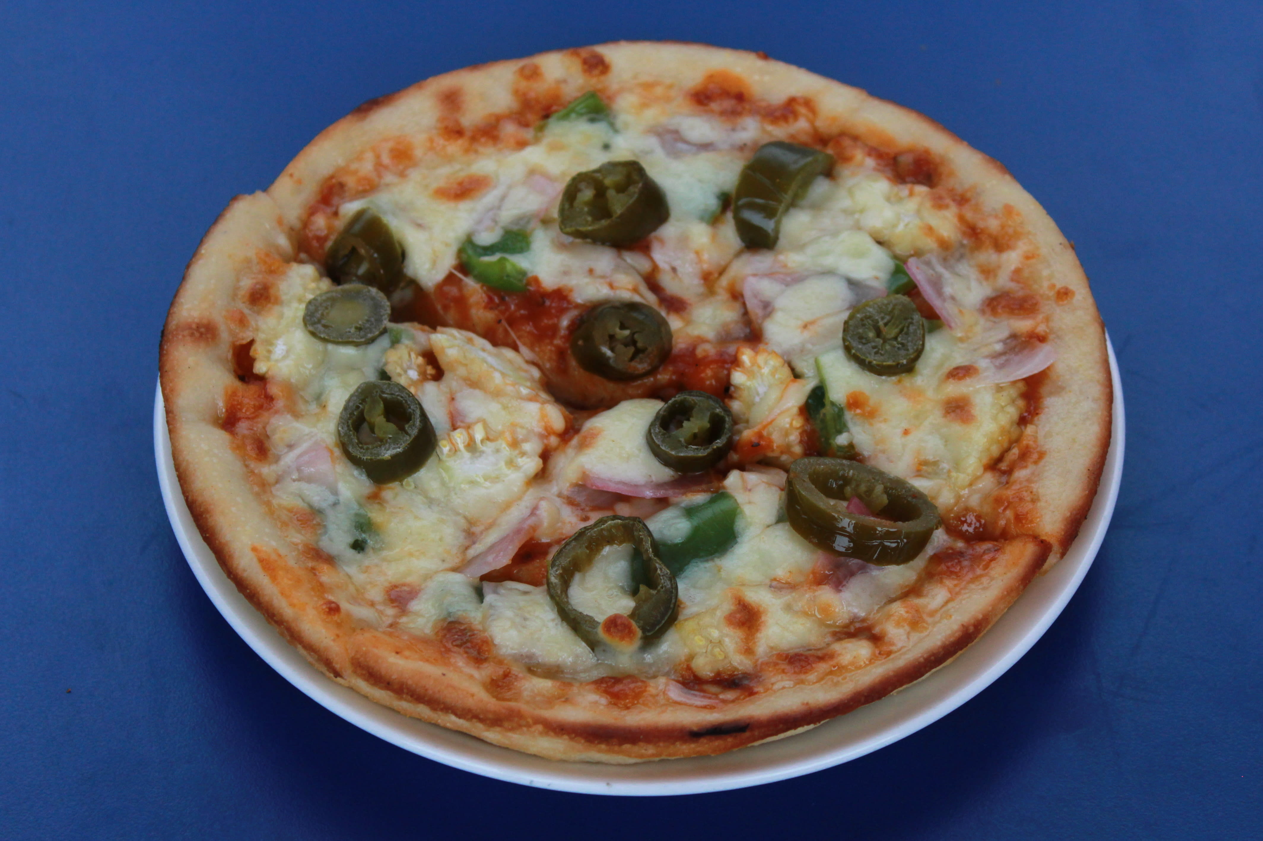 Delight Hunk's Pizza - Logo