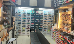 Delite Foot Wear - Logo