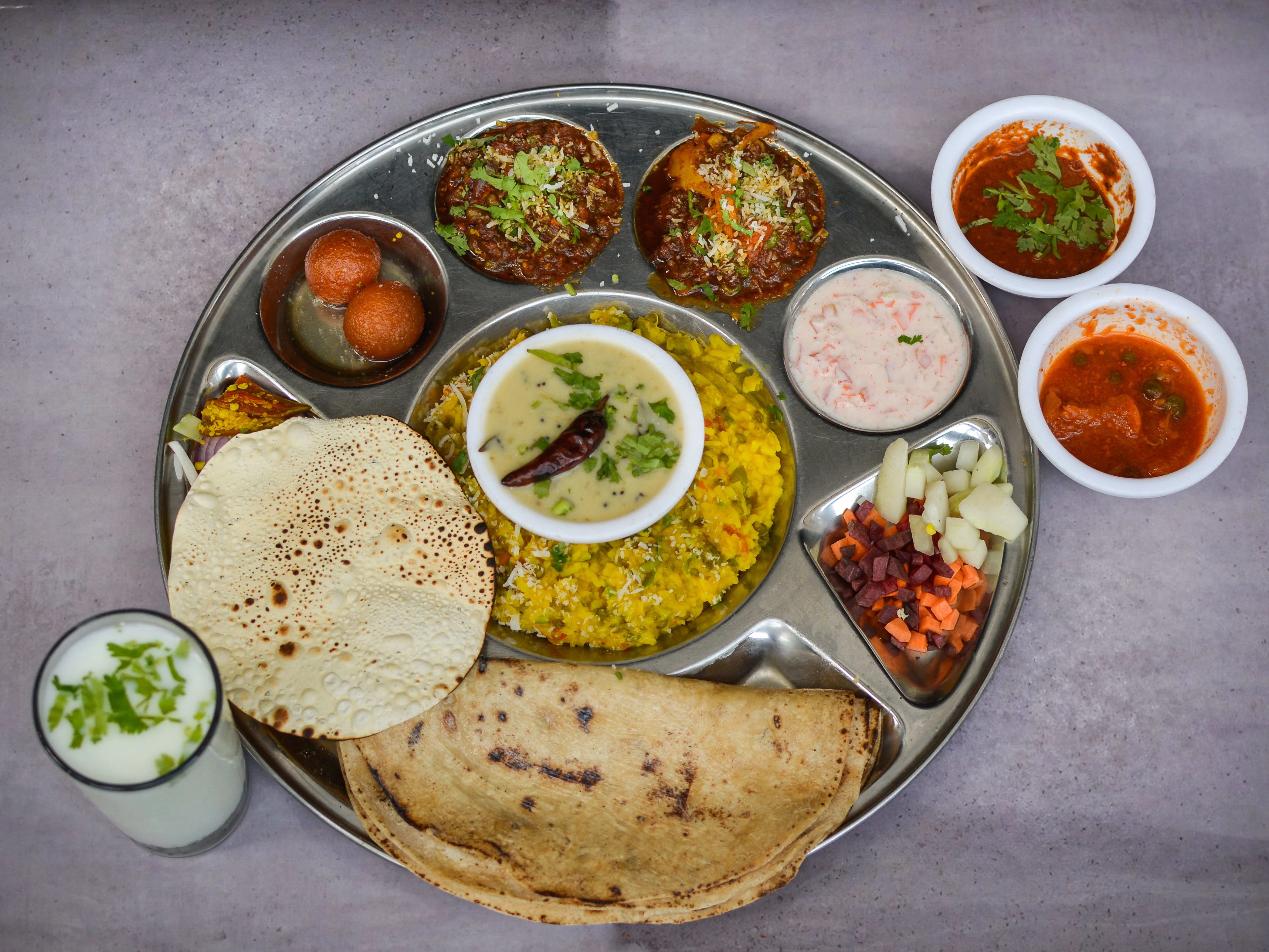 DELIVER MY THALI - Logo