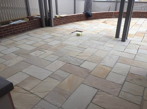 Deluxe Surrounds Landscaping - Logo