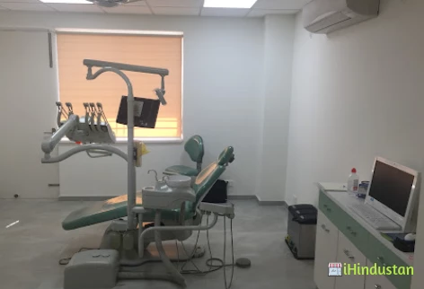 Dentessence Dental Clinic - Dr Ravi S Batra - Logo