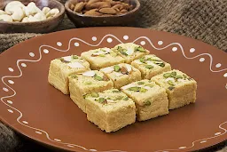 Desher Methai - Logo
