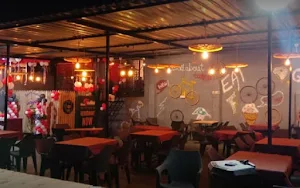 Desi Tadka Family Garden Restaurant - Logo