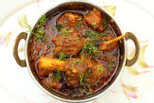 Desi Tadka Family Garden Restaurant - Logo