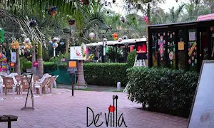 De' Villa Garden Restro Lounge - Logo