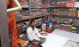 Dhanvi Sarees & Matching Centre - Logo
