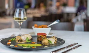 Dhaya Kai Kani Maligai - Logo