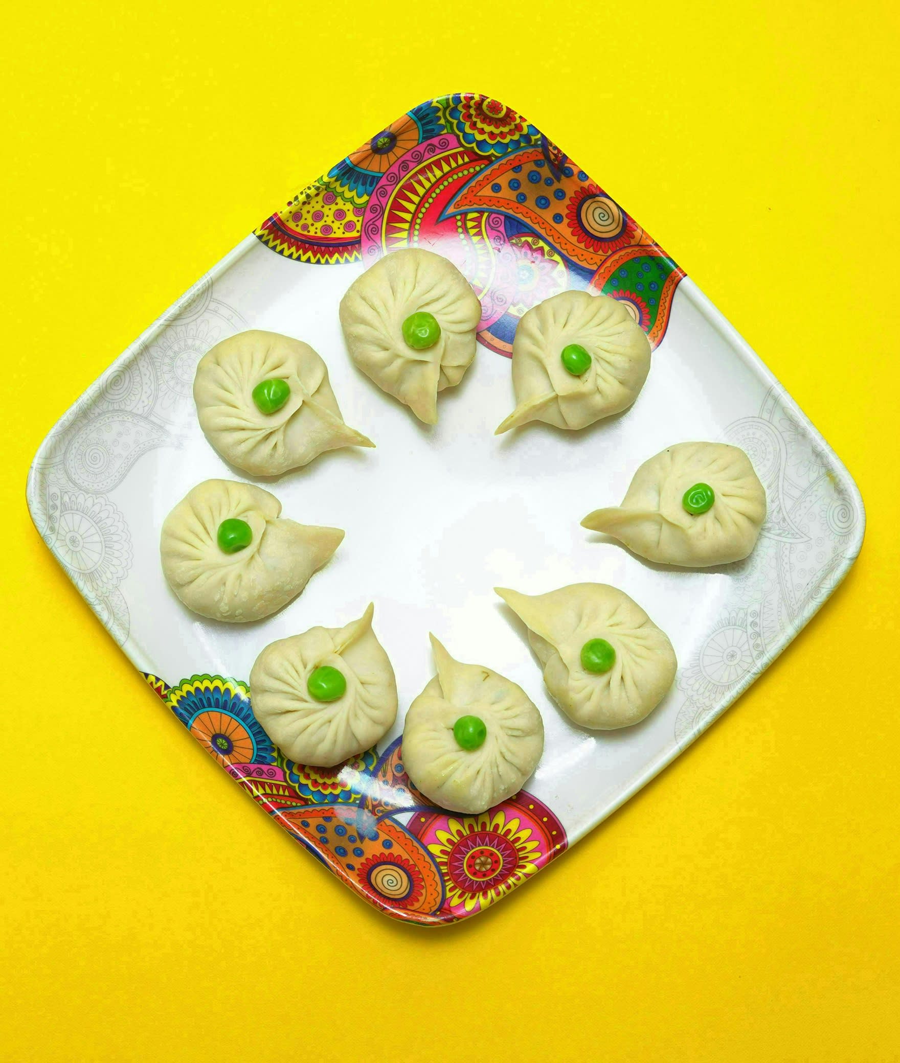 Dhoom Machale Momos - Logo