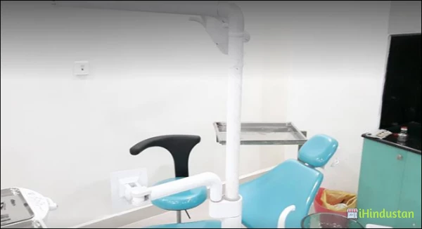 Dinesh's Dental Paradise - Logo