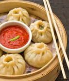 Dollma aunty momos - Logo