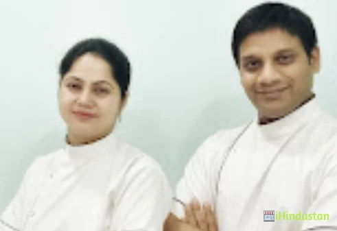 Dr. ANUPAM'S TOWN DENTAL - Logo