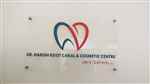 Dr Harish Root Canal And Cosmetic Centre - Logo