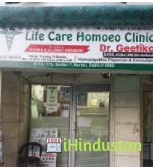 Dr Kamakshi Memorial Hospital - Logo