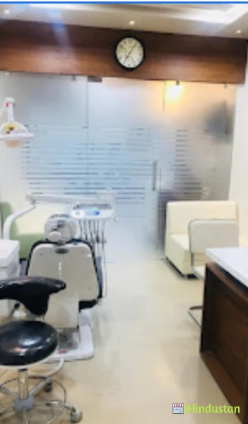Dr. Mansi's Dental Clinic and Implant center - Logo
