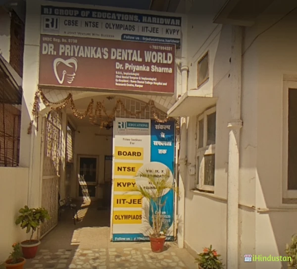 DR. PRIYANKA'S DENTAL WORLD - Logo