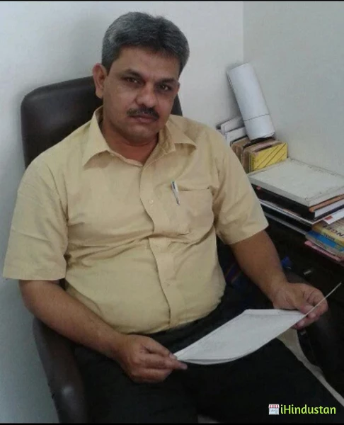 DR. RAJESH D. SANJA - Logo