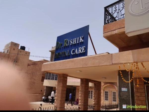 DR RISHIK DENTAL CARE - Logo