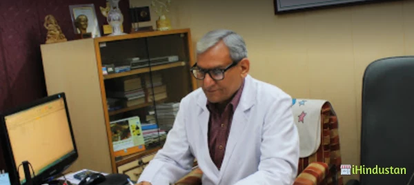 Dr. R.K. Trigotra - Logo