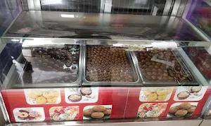 Dwarka Sweets Dryfruits And Numkins - Logo
