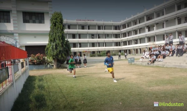 East West Model School - Logo