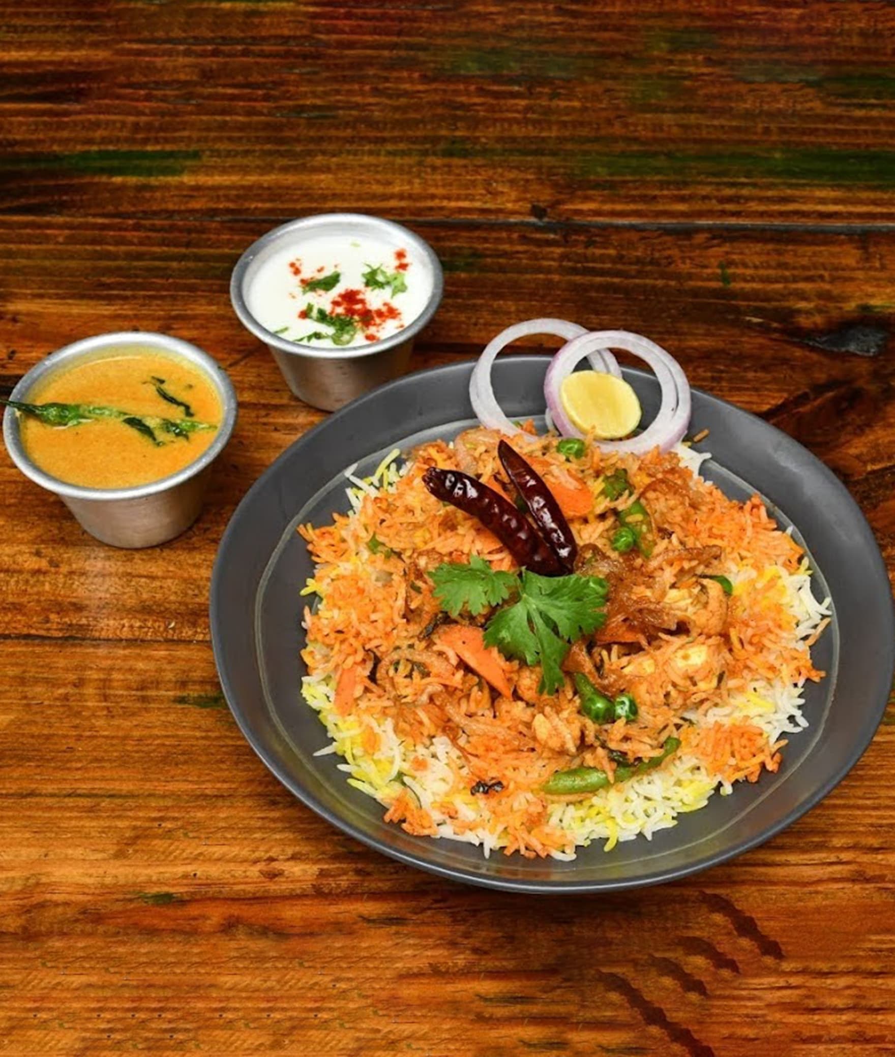 EAT AGAIN BIRYANI & MORE - Logo