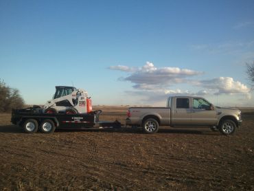 Eaton Snow Removal &a; Excavating - Logo