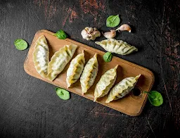 Everest Momos - Cover photo