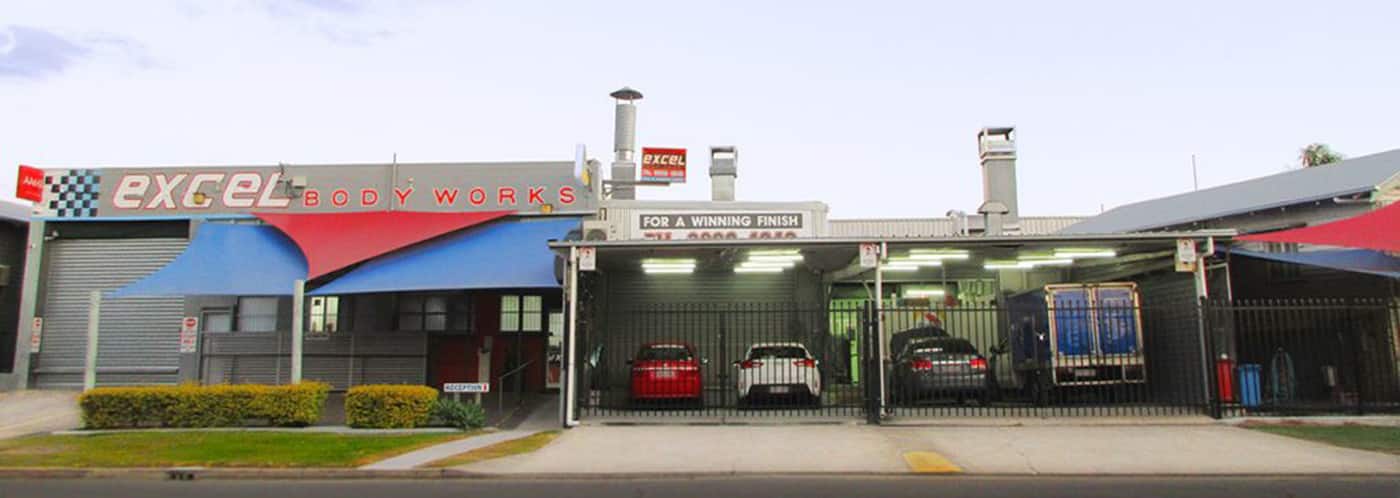 Excel Body Works - Logo