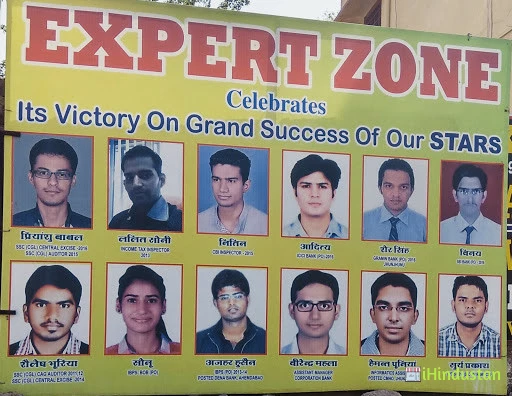 EXPERT ZONE COACHING CLASSES - Logo