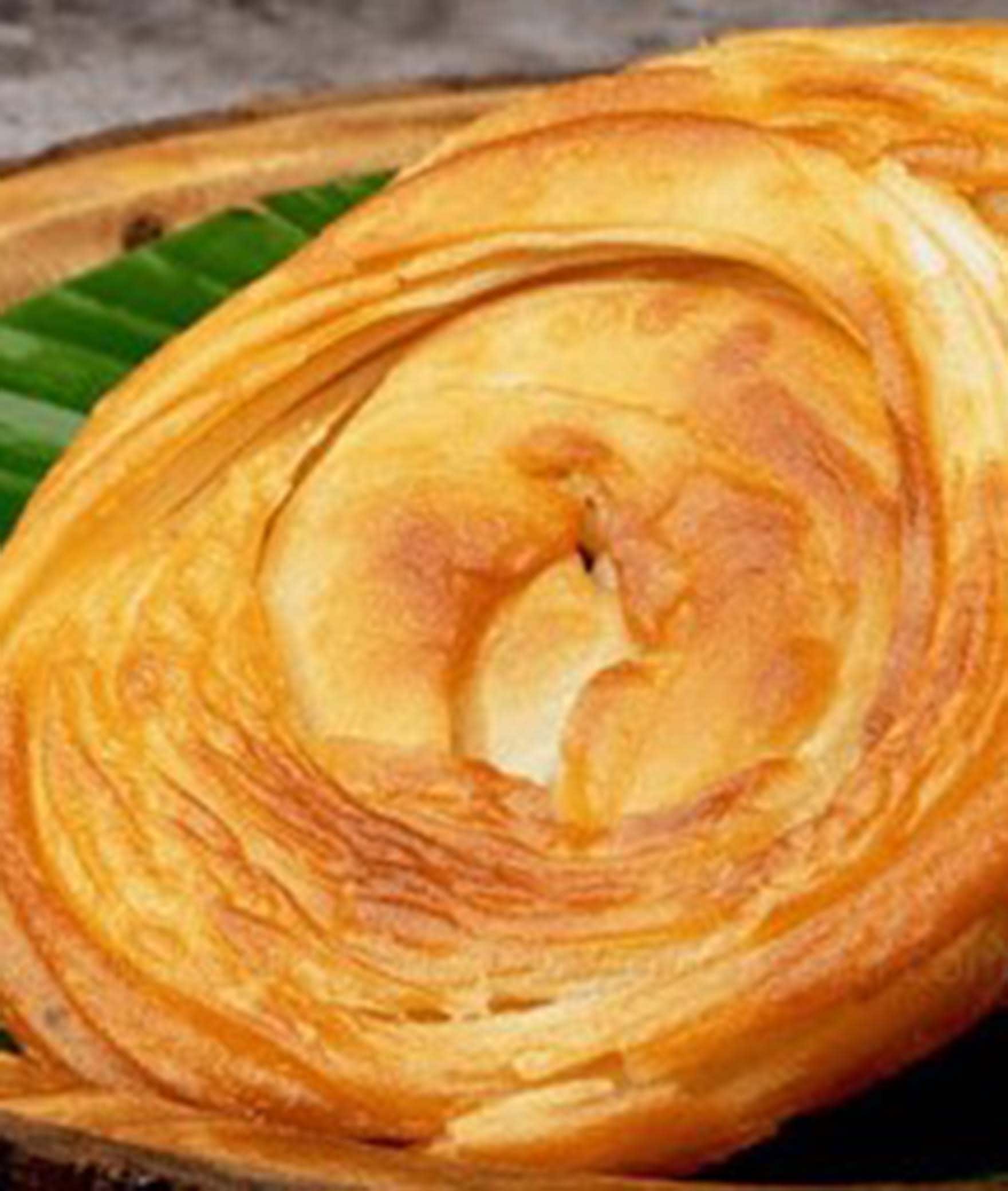 Famous Parottas - Logo