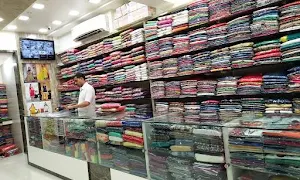 Famous Silk And Sarees - Logo