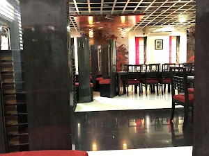 Flames Restro & Bar - Raghu Mahal Hotel - Logo
