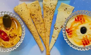 Flavors of hummus - Logo