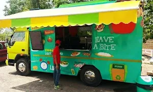 FoodeeAdda: Food Truck with Dine-In - Logo