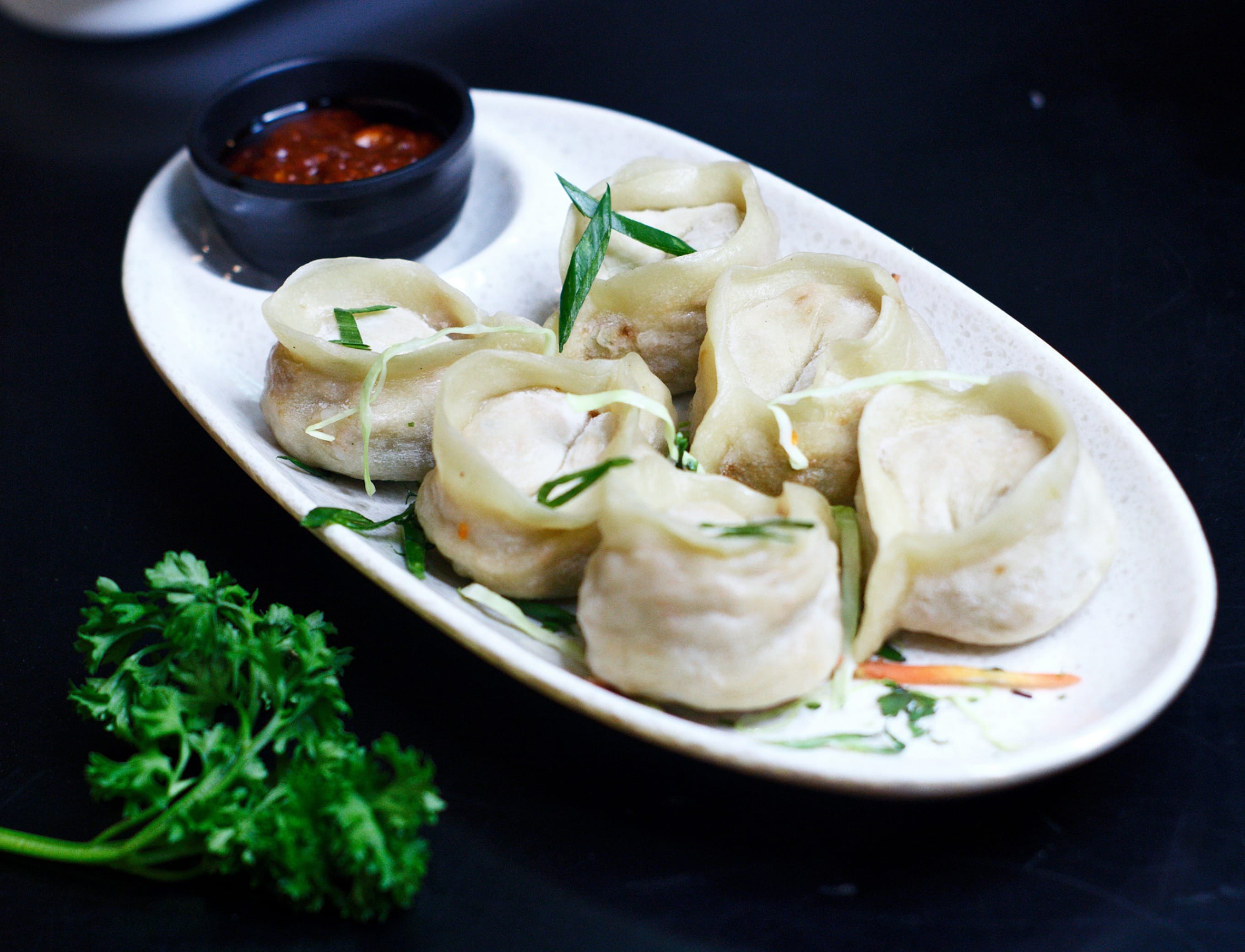 Gaurav Momos - Logo
