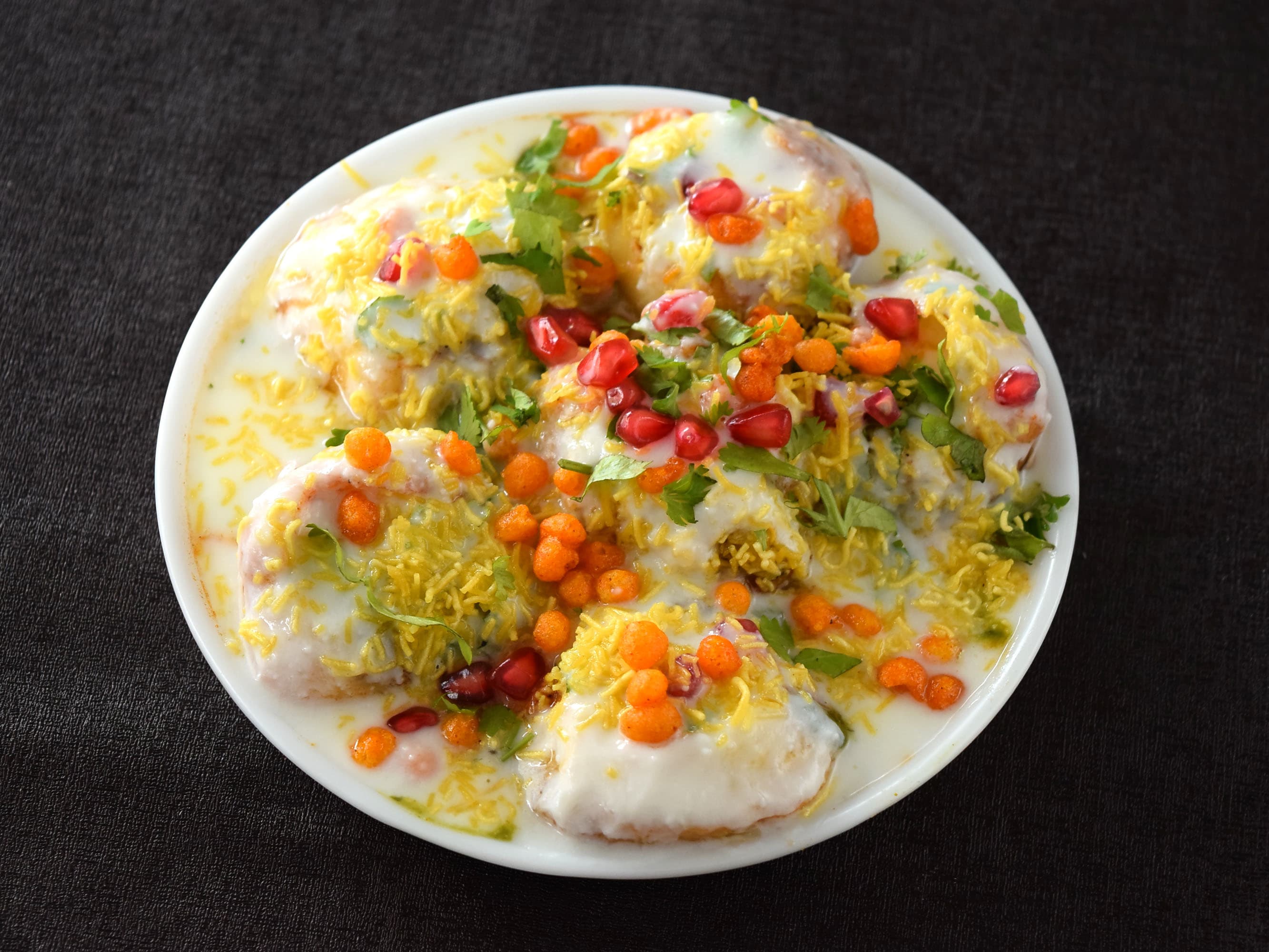 Geetham Sweets, Savouries and Chaats - Logo
